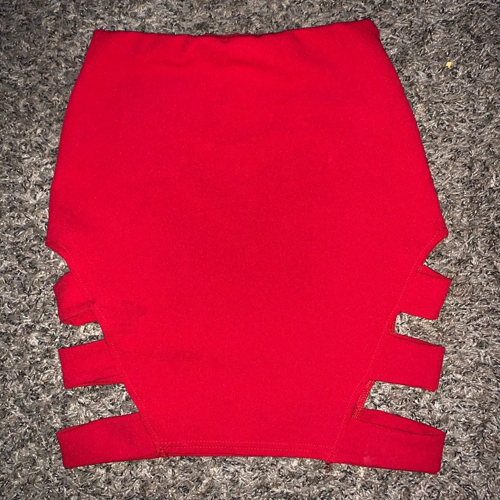 Red tight skirt with slits on the sides